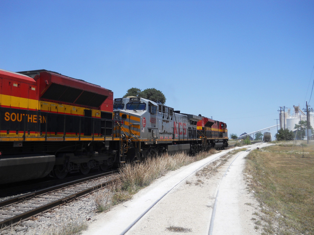 KCS 4581  17May2011  No. 2 NB past McNeil Store with Stacks 